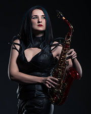 Katherine holding her red alto sax